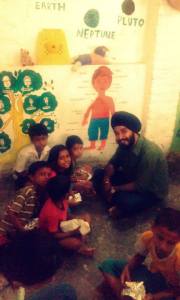 Volunteers spend time with the children at Lakshyam
